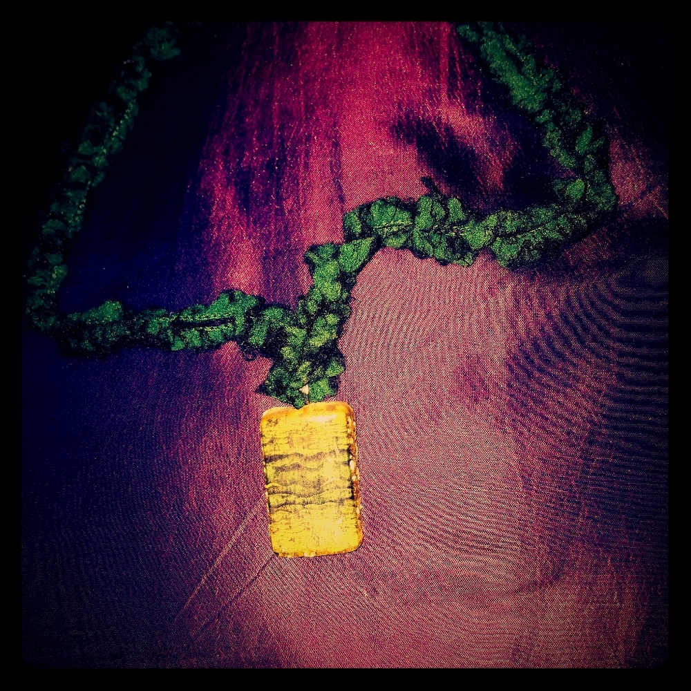 Handmade resin necklace.
